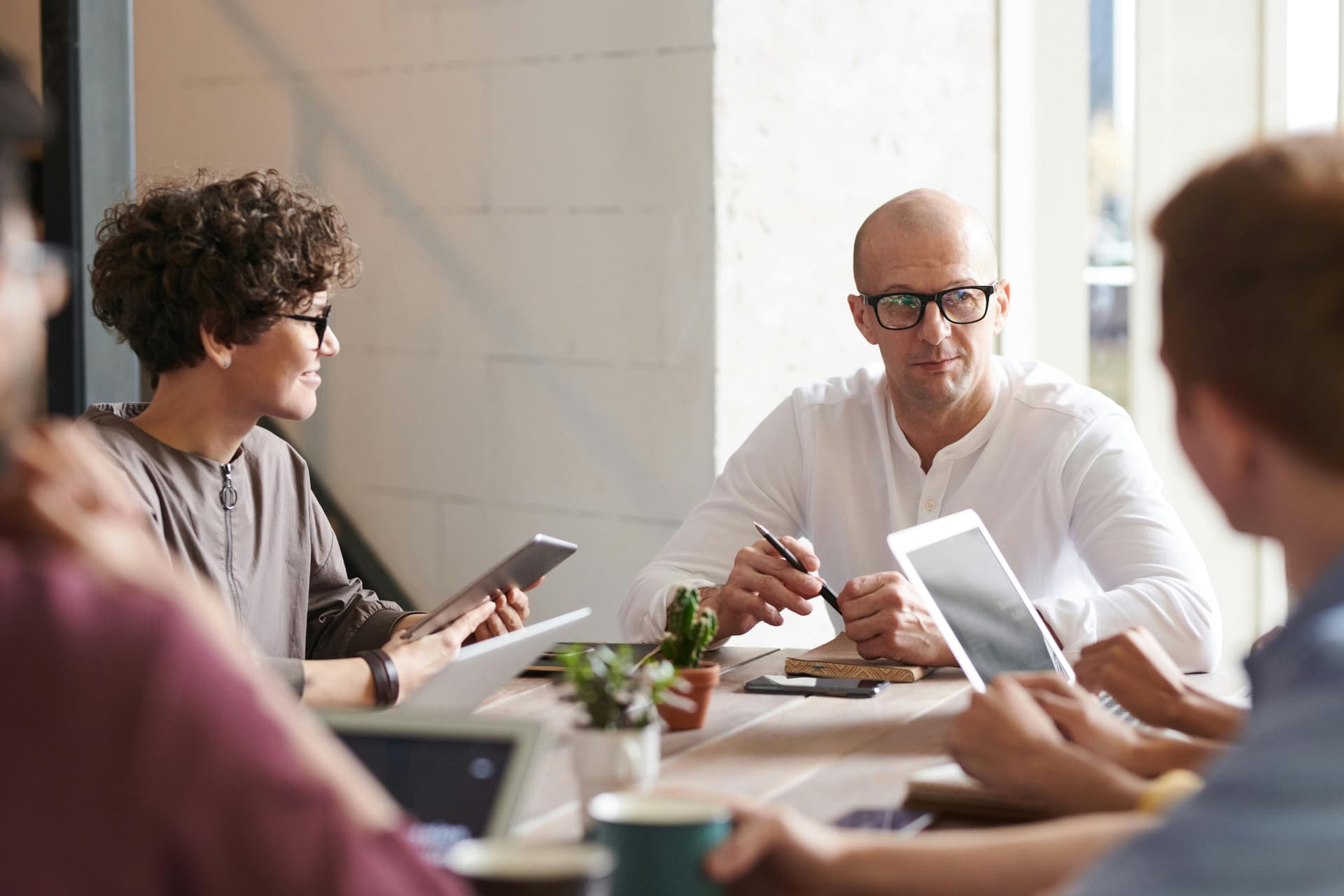 Some people sitting around a table